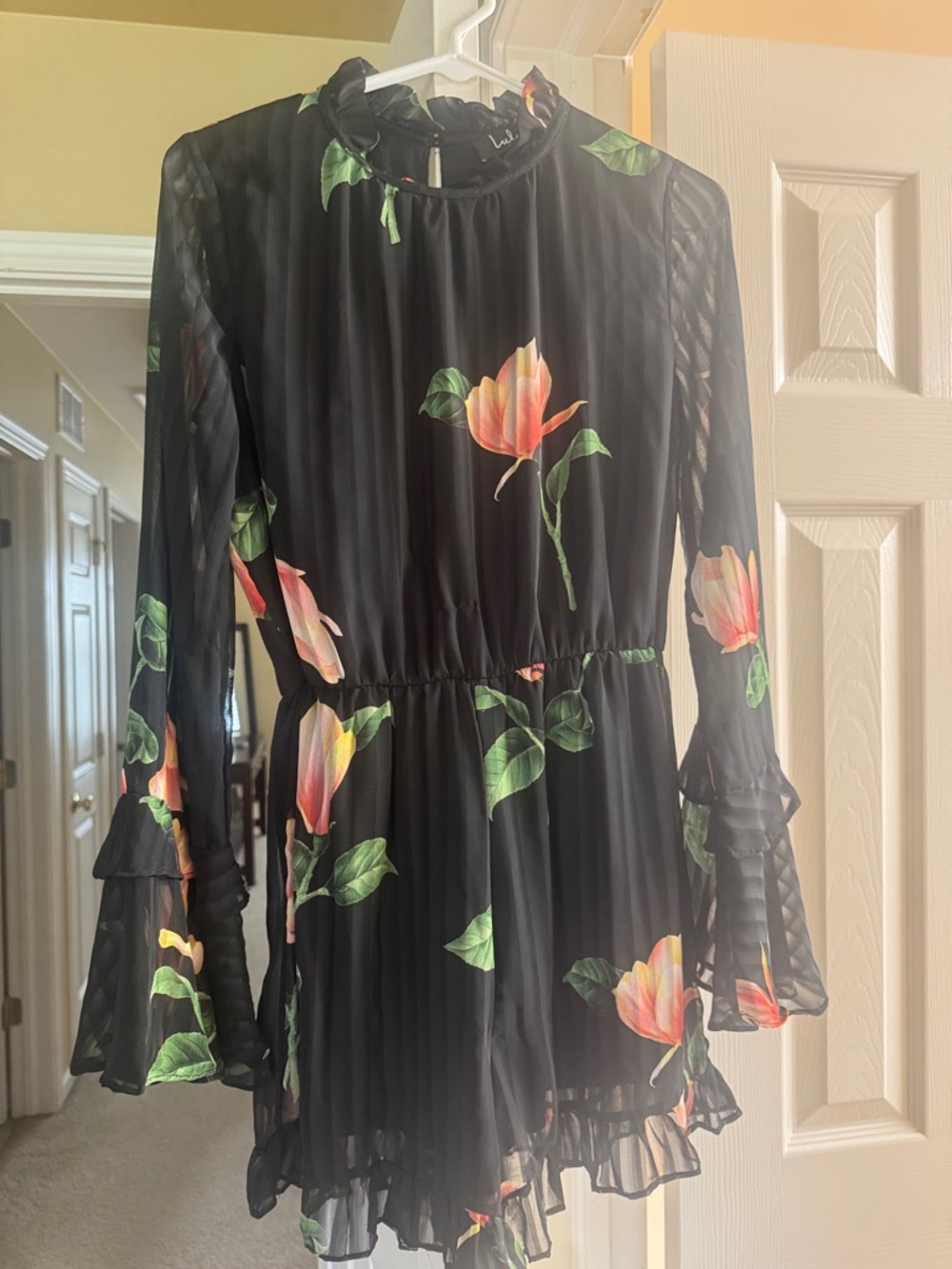 Lulu's Black Floral Long-Sleeve Romper with Ruffle Trim